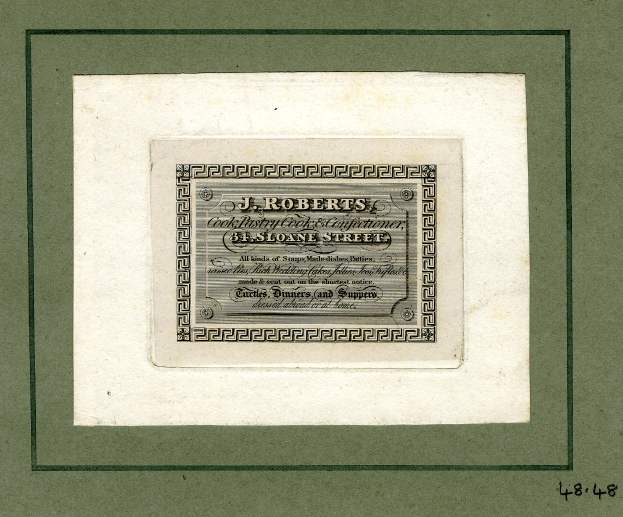 Ein Foto Rahmen mit einer Aktienurkunde mit dem Text "J.R. Roberts, Inc." und verschiedenen Zahlen.