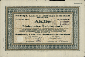 Ein altes deutsches Banknoten mit einem schwarzen Hintergrund und dem Text "Rudolph Karlstadt Aktiengesellschaft Hamburg" darauf.