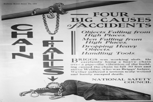 Ein Schwarz-Weiß-Plakat mit einer Person auf einem Pfahl mit Ketten, auf dem steht: "Vier große Unfallursachen."